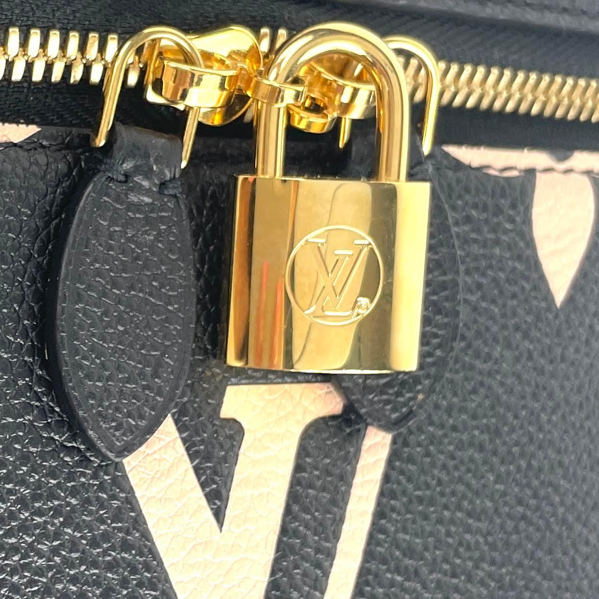 LOUIS VUITTON Bicolor Monogram Empreinte Vanity PM