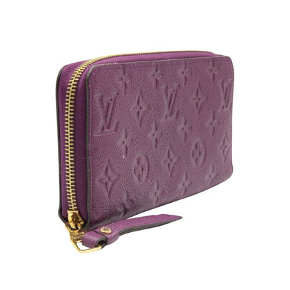 LOUIS VUITTON Purple Monogram Embossed Zippy Wallet