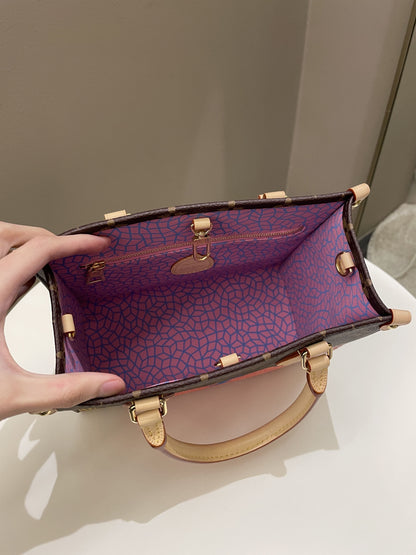 Louis Vuitton x Yayoi Kusama OnTheGo PM Monogram coated canvas