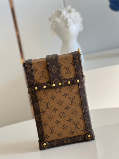 Louis Vuitton Vertical Trunk Pochette Bag