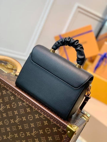 Louis Vuitton Twist PM bag