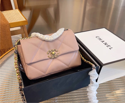 Pink Chanel woman handbag