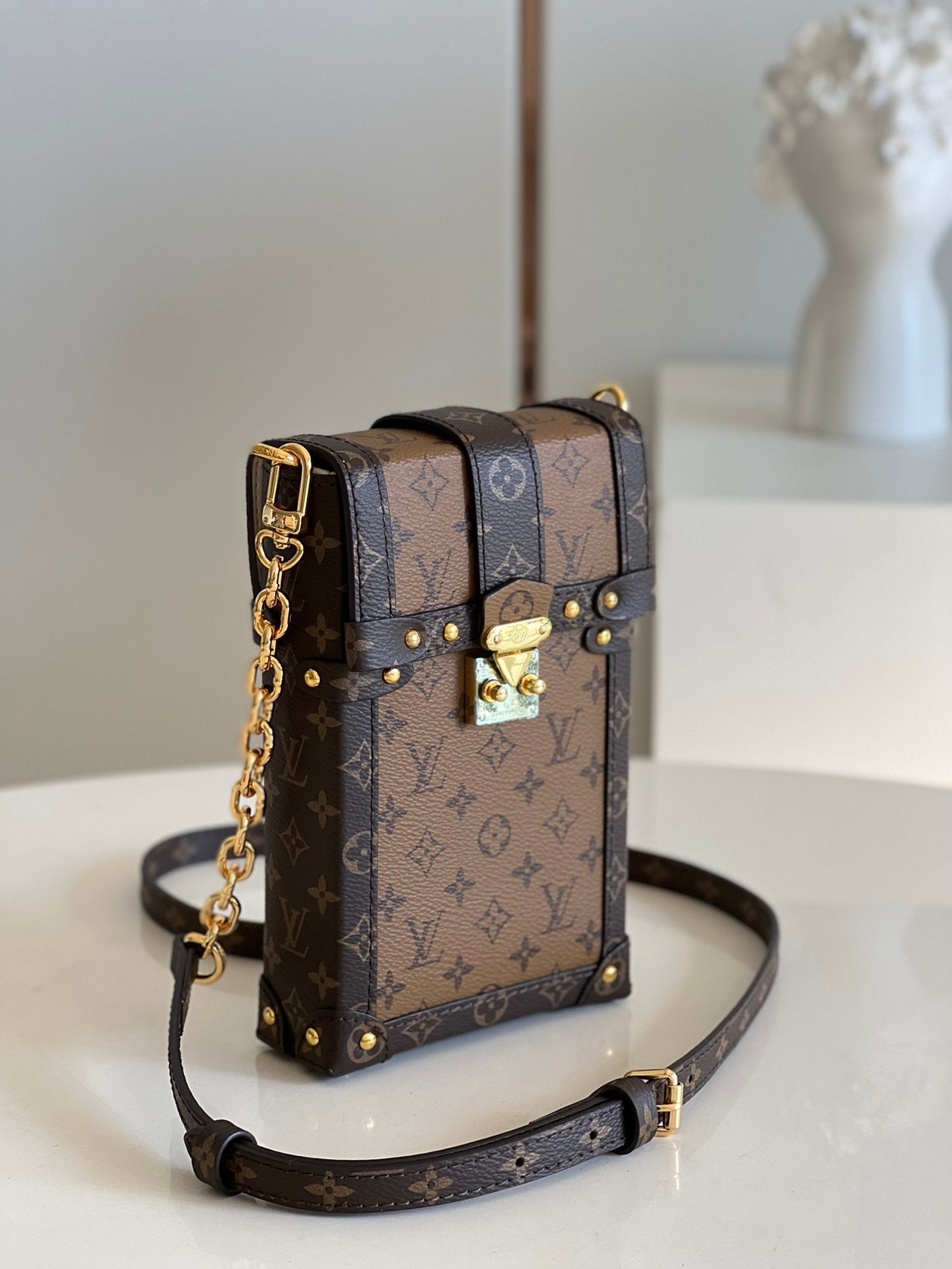 Louis Vuitton Vertical Trunk Pochette Bag